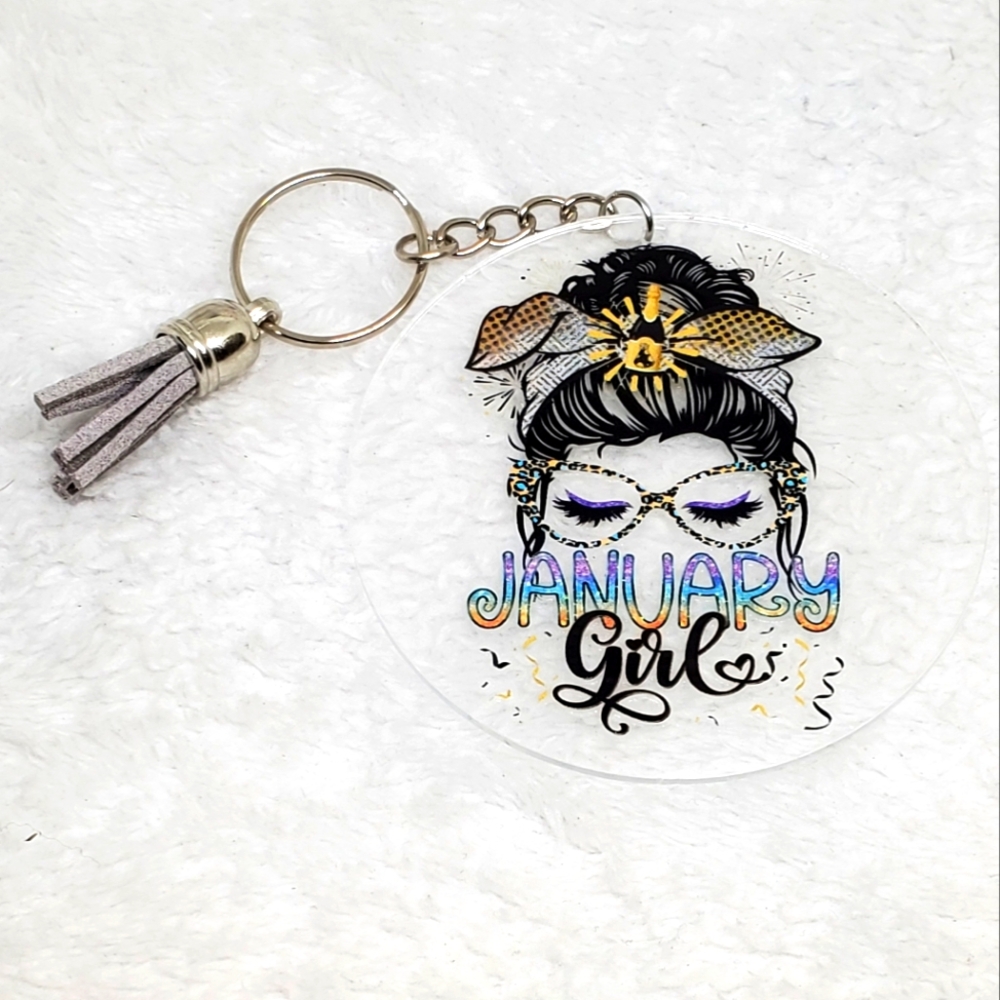 7/$10 January Girl Acrylic Keychain with Tassel, New
